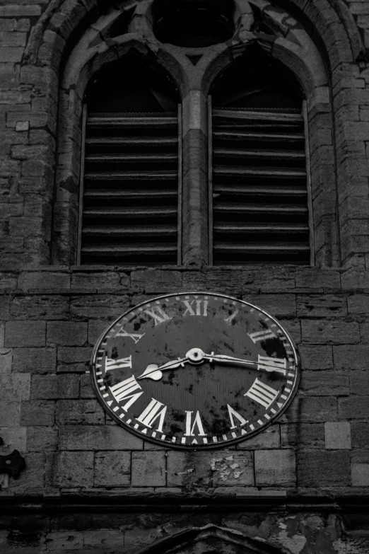 a black and white po with a clock in the center