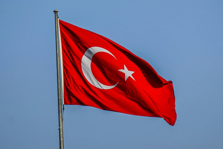 the flag of turkey with the star and moon on it