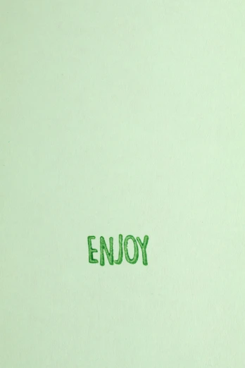 the word enjoy is made with green string