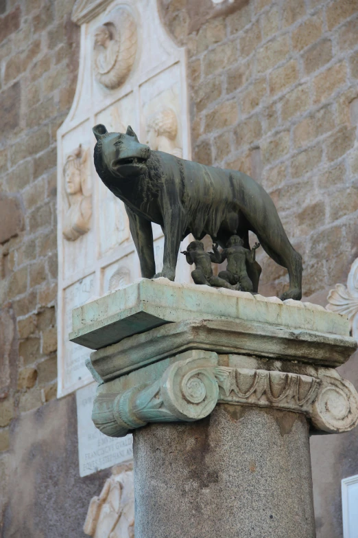 there is a stone lion sculpture at the base