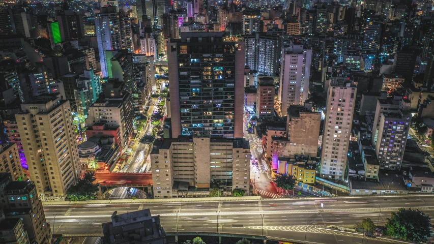 a nighttime s of a large city and freeway