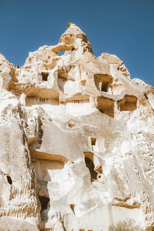 a mountain in the mountains has intricate carvings on it