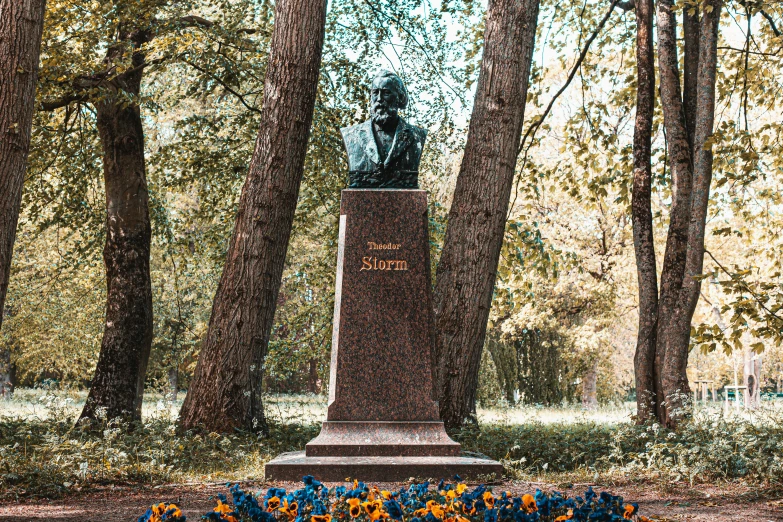 a monument in the middle of some trees