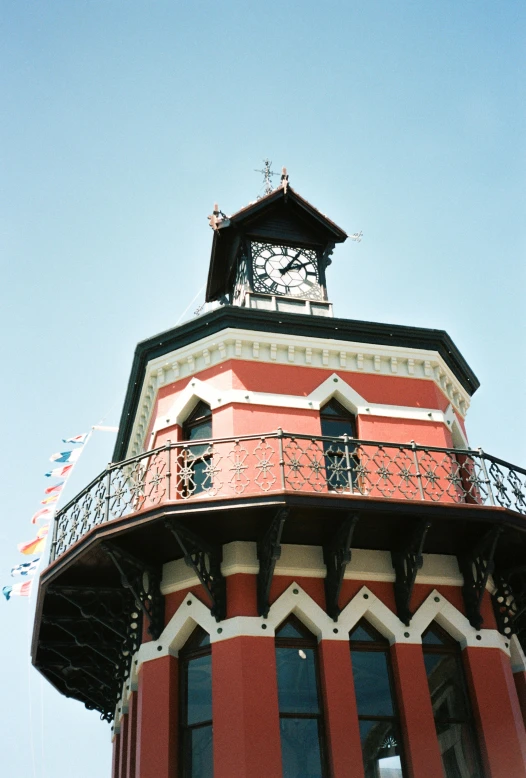 a large building with a big clock on the top of it