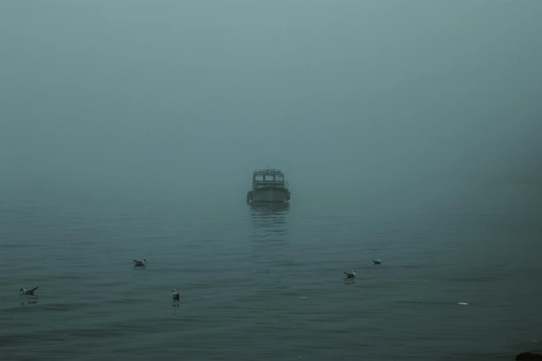 a boat that is floating in the ocean