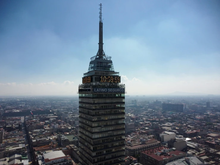 a clock tower on the top of an office building