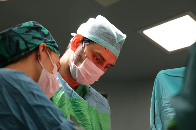 a medical professional is working in the operating room