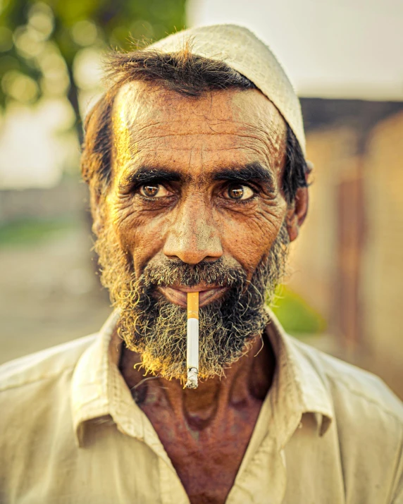 a man with a beard and a shirt on