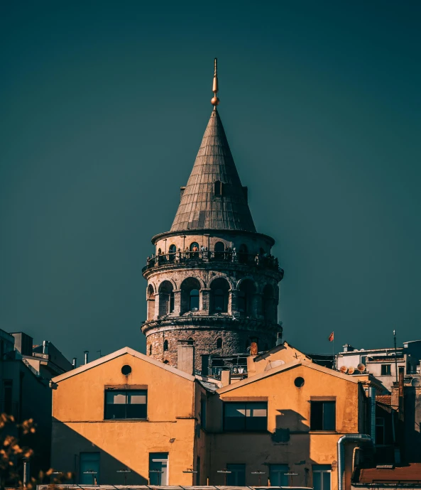 a tower made of clay on top of a building