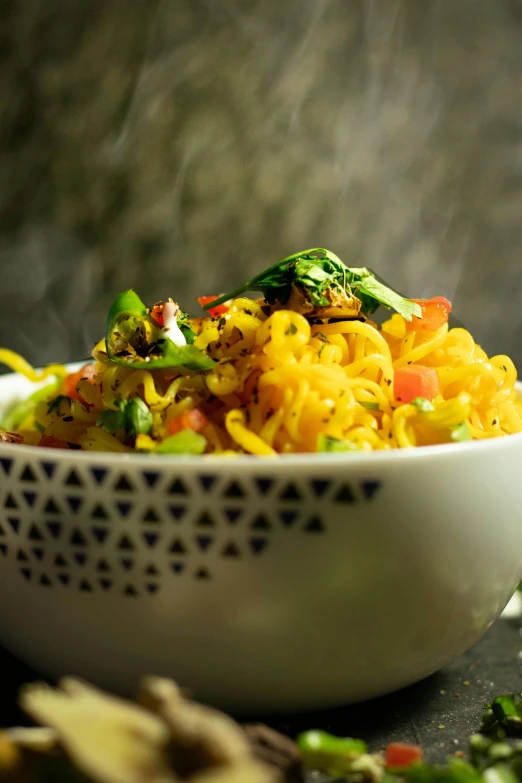 a bowl of food with noodles and other toppings