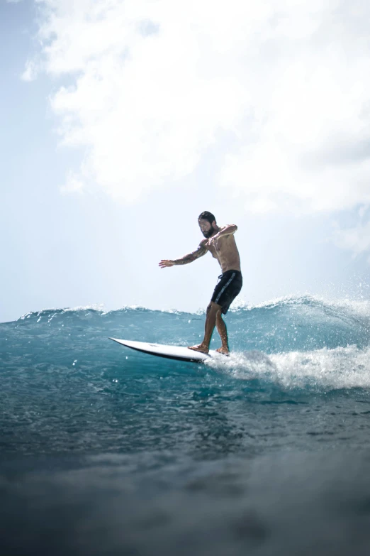 a person on a surfboard in the water