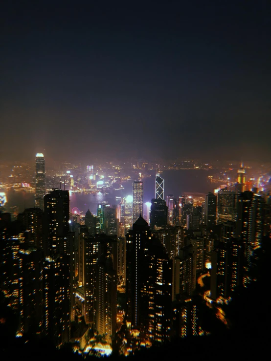 the lights of a big city can be seen on this city at night