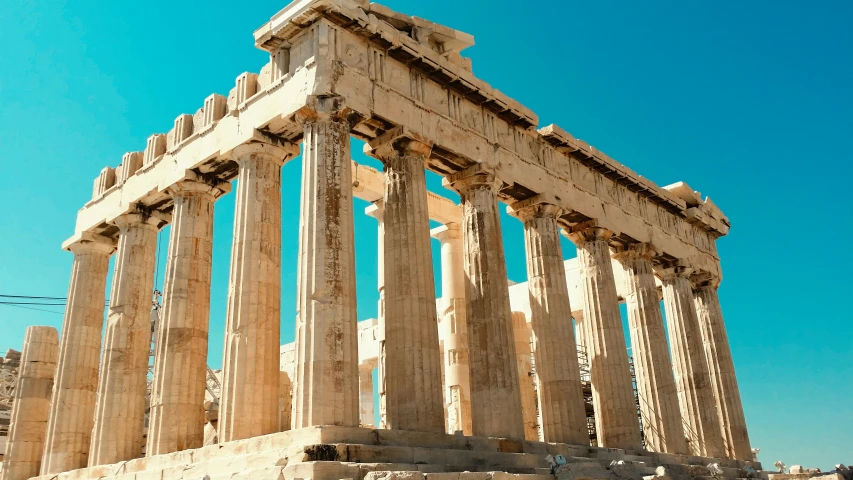 a roman structure sitting alone in the sun