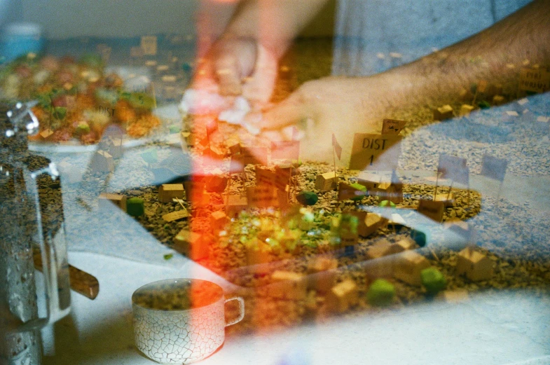 person  up a cake at a table