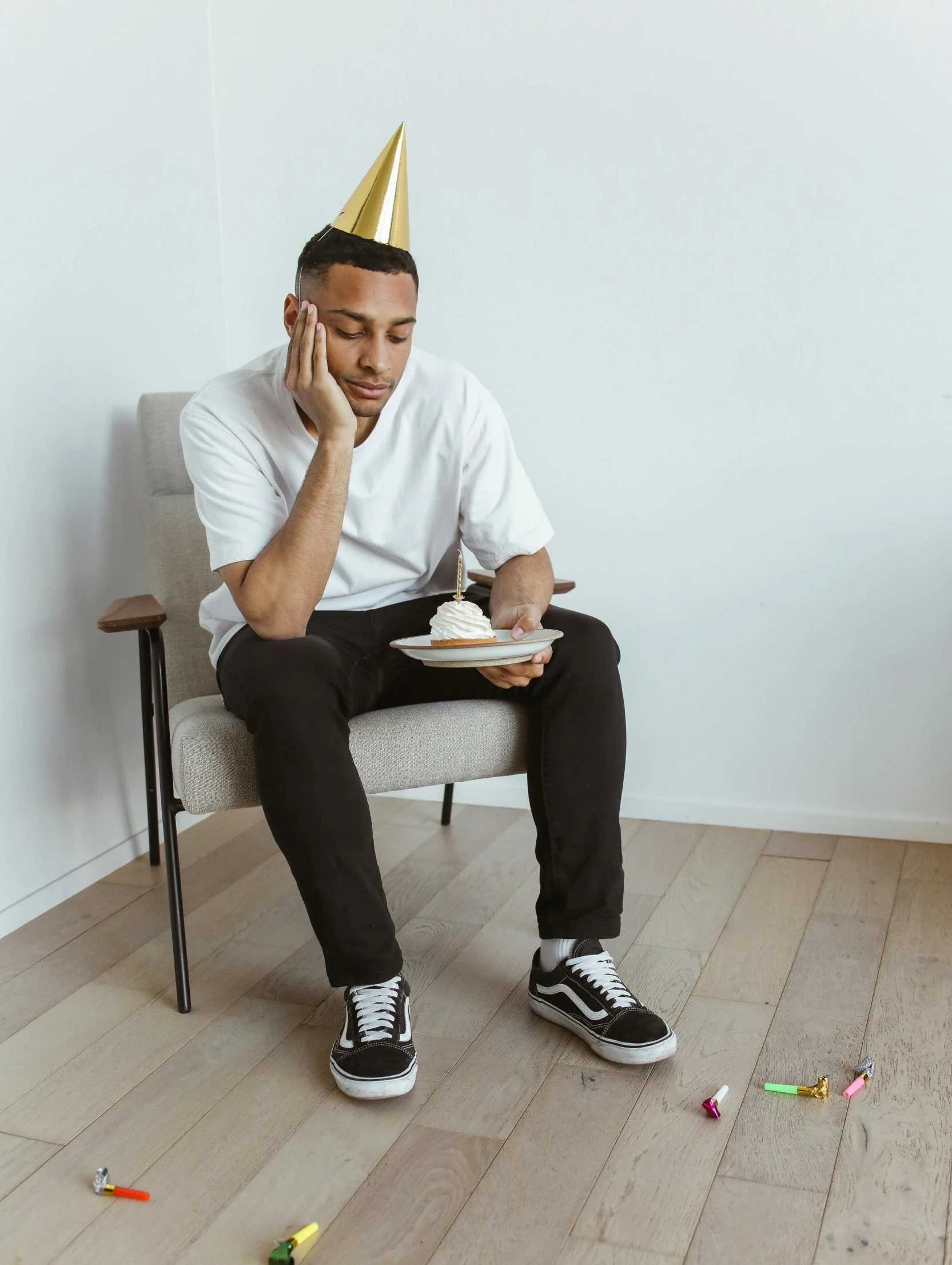 a man is eating soing out of a plate