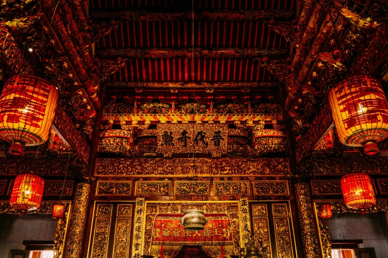 interior view of a chinese temple with several lights