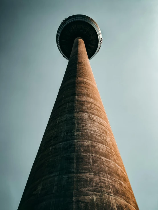 a tower has a sky line below it