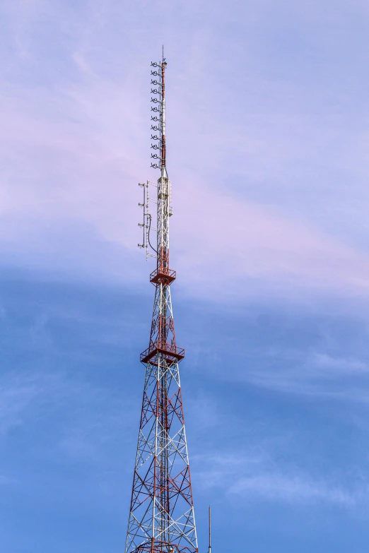 tower with a phone and a cellular cable