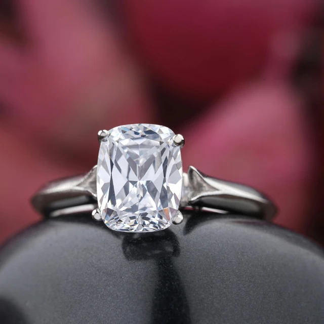 an engagement ring with an oval diamond and matching band