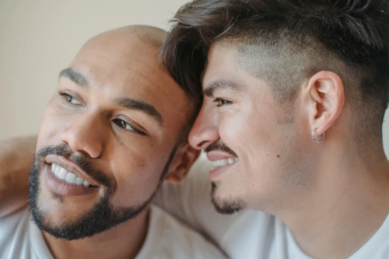 the couple is posing for a po smiling