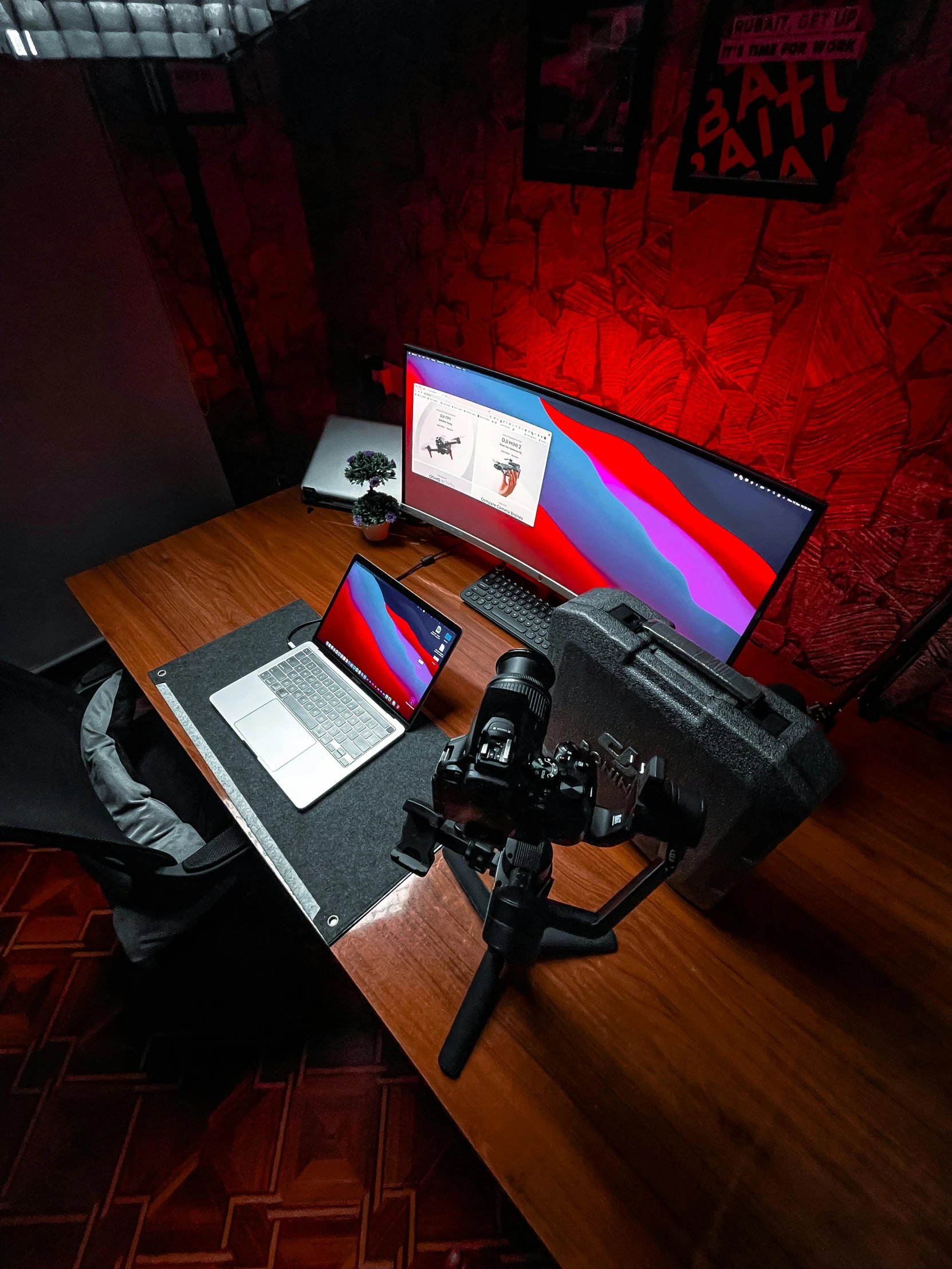 a computer monitor and a laptop are sitting on a desk