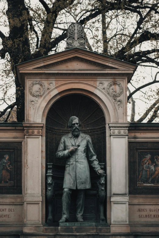 a statue on display in front of a church