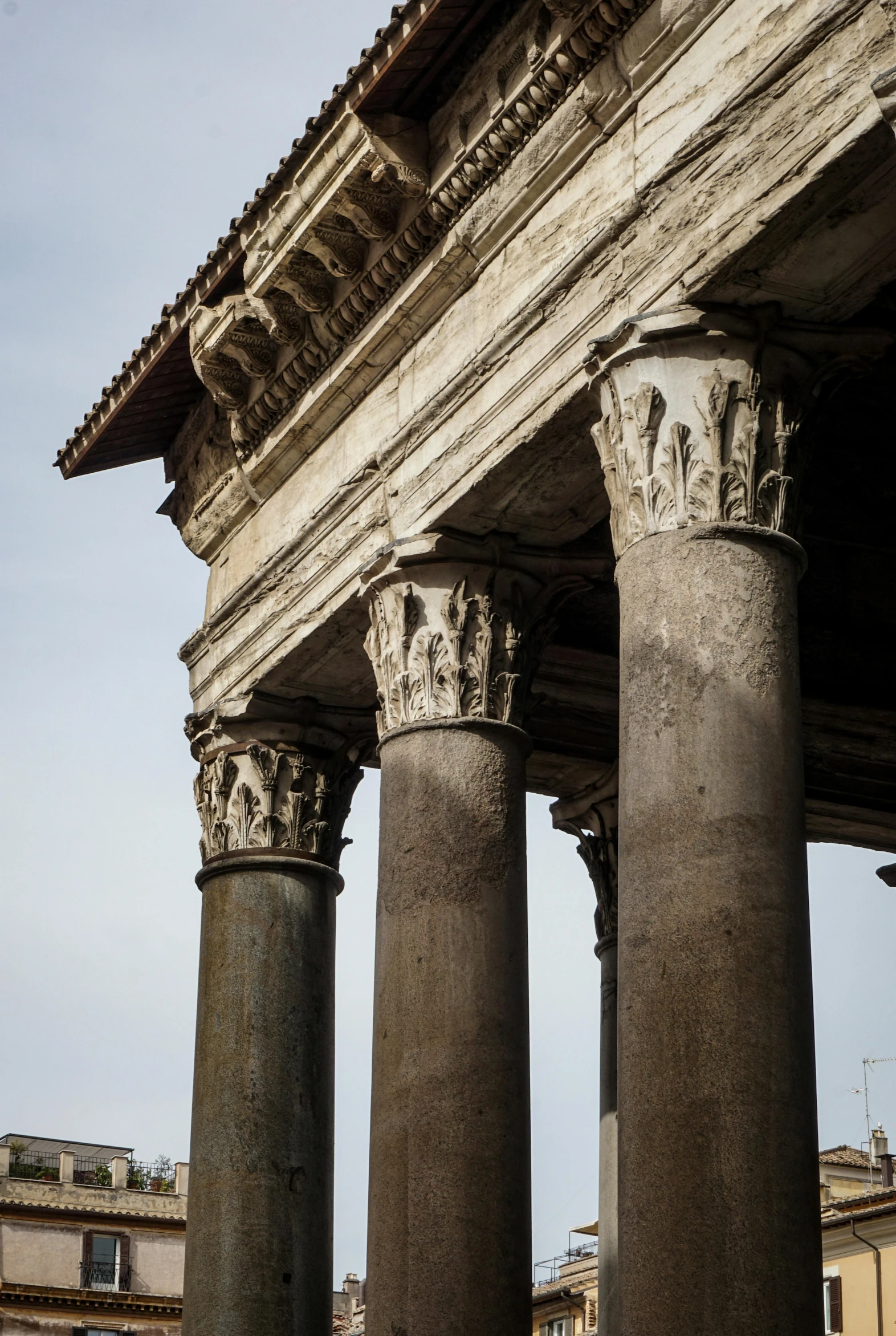 columns with intricate detailing against a clear sky