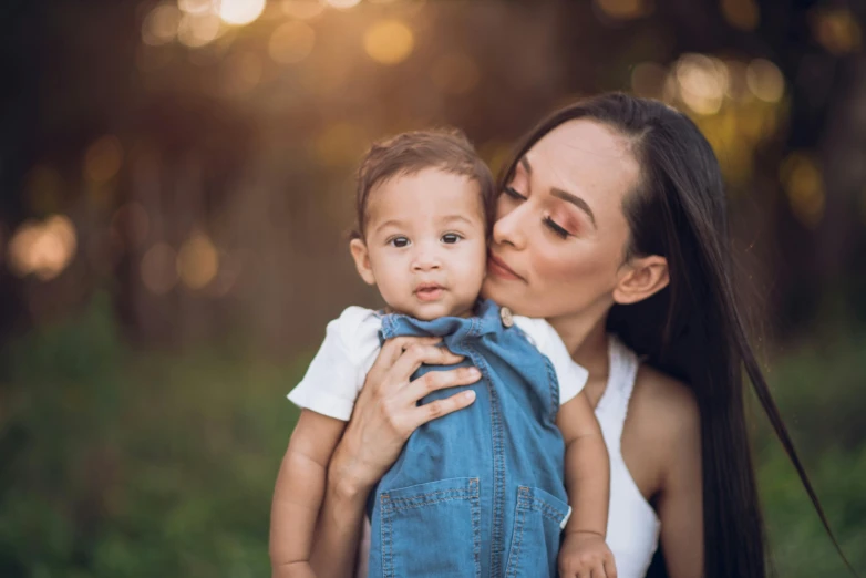 a woman and her child are enjoying the moment together