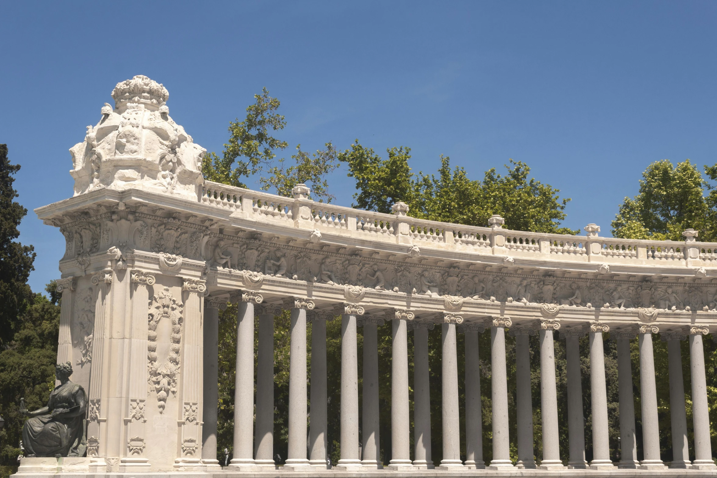 this is an ornate, white building with columns