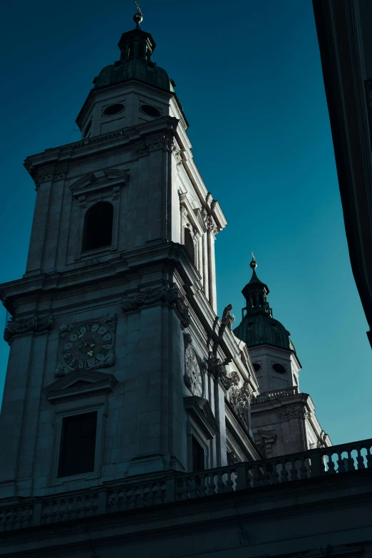 a tall clock tower next to a building