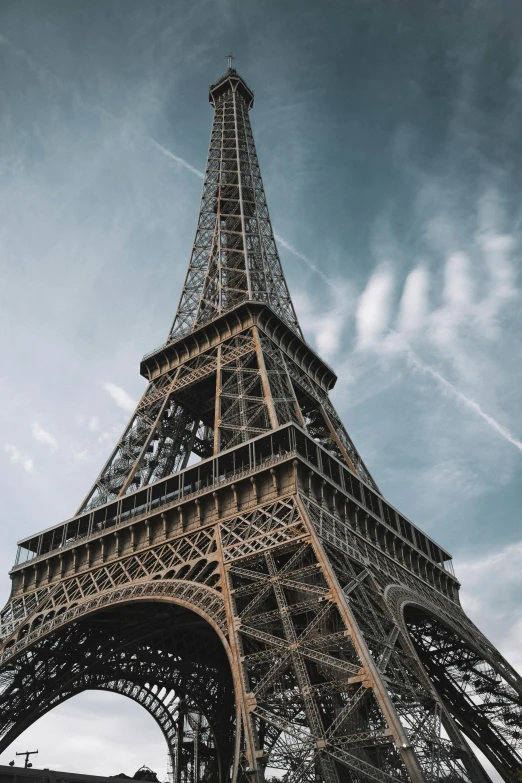 a tall tower sitting on the side of a road