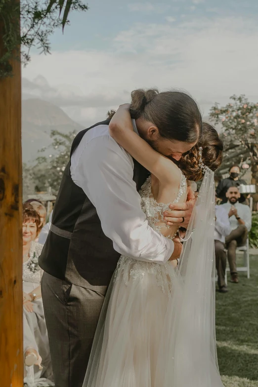 the bride and groom are dancing at their wedding