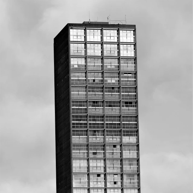 a tall skyscr that has many windows on it