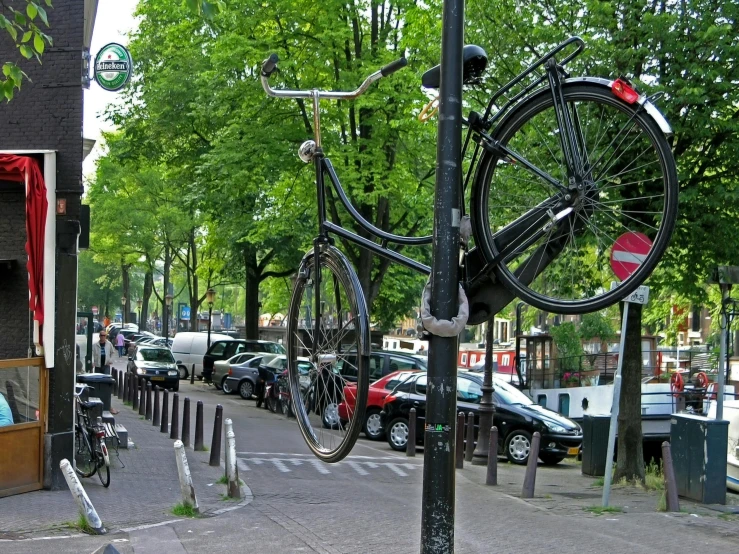 a bicycle upside down in the street