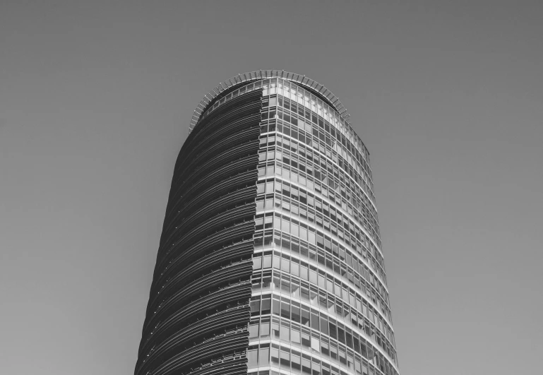 tall building in the city against a clear sky