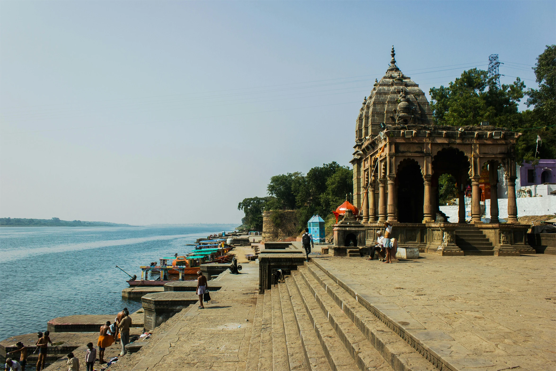 there are many steps to the beach going up to the water