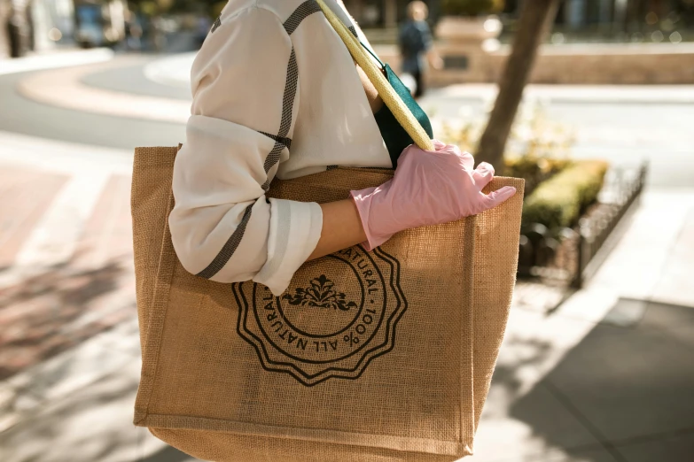 a woman holding a bag that looks like an octo