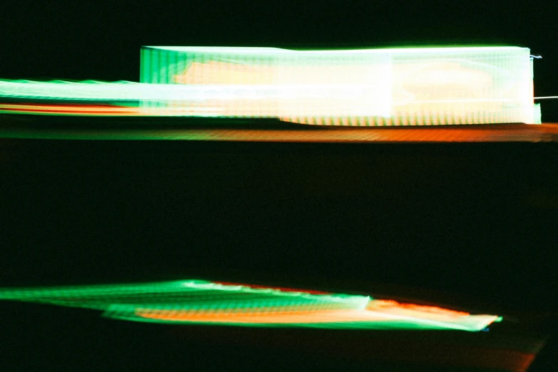 motion blur pograph of a green rectangular object