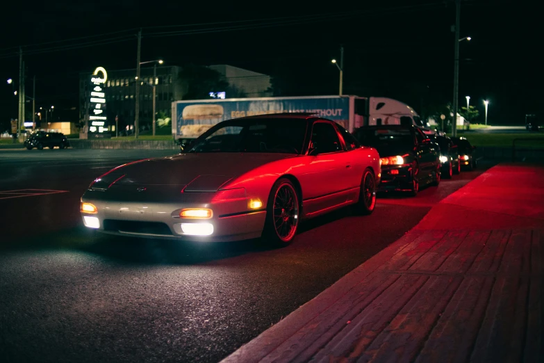 some cars are parked next to each other on the street