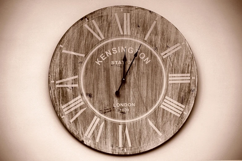 a clock that has roman numerals on the face of it