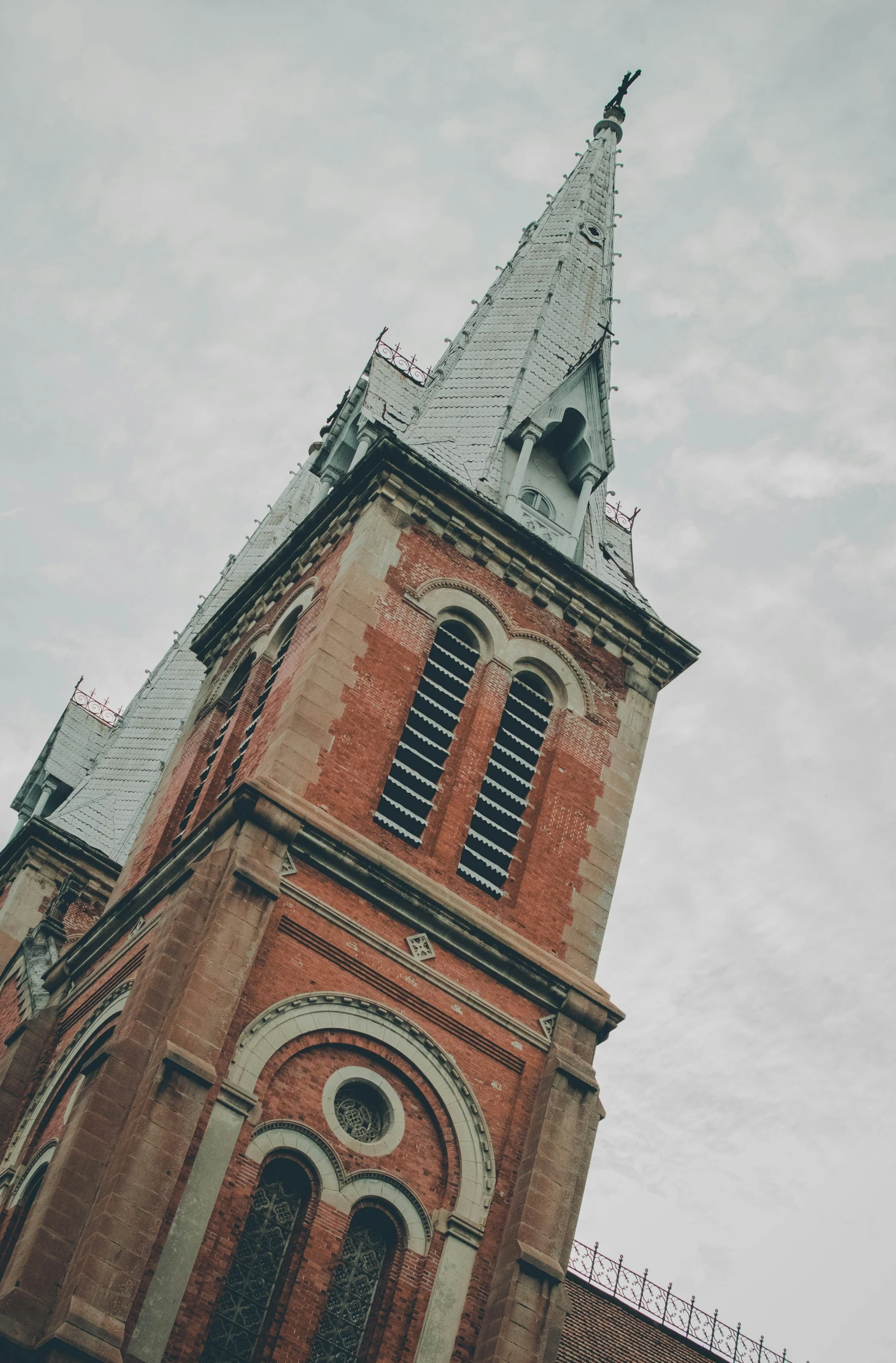 a large church building with a sky background