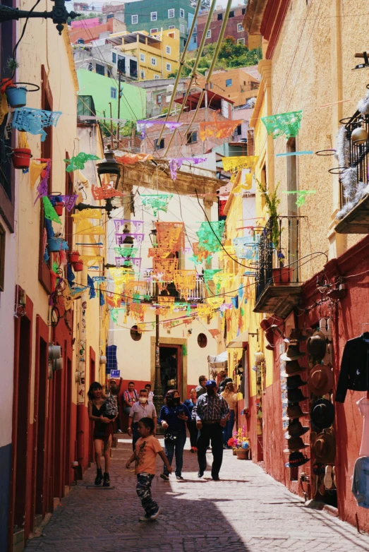 an image of people walking down the street