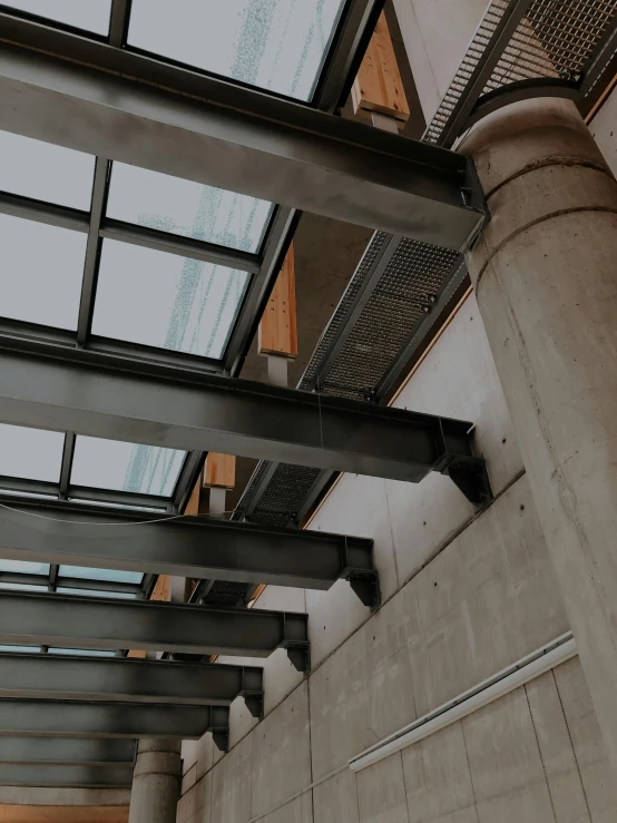 several windows are seen from the inside of the building