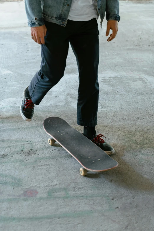 a man is riding his skateboard through the concrete