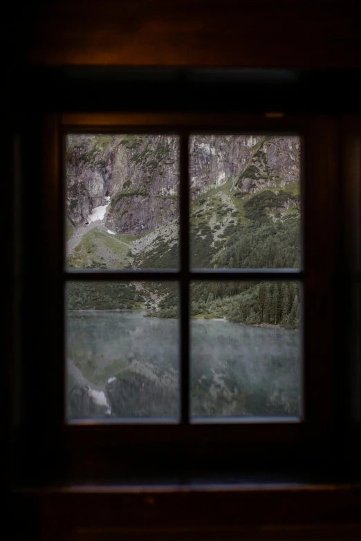 a small window with an open view of trees