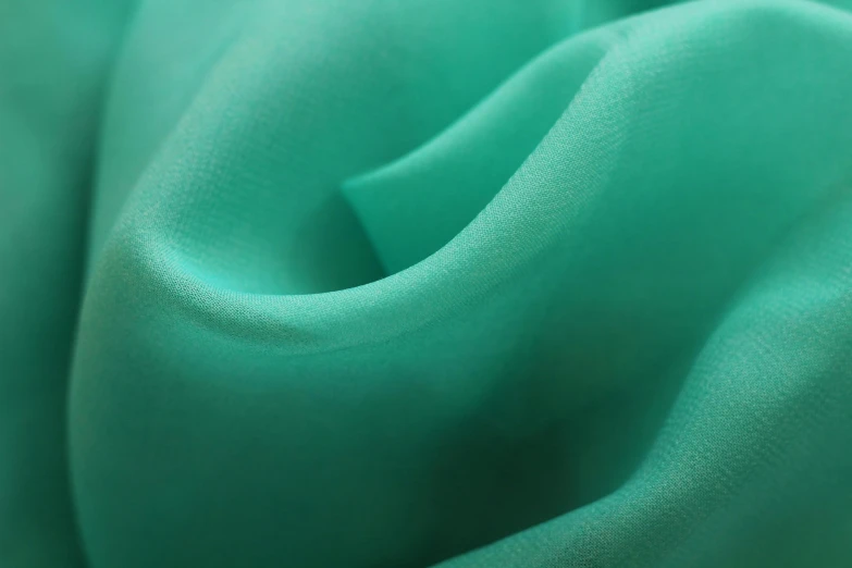 a closeup view of a teal colored material