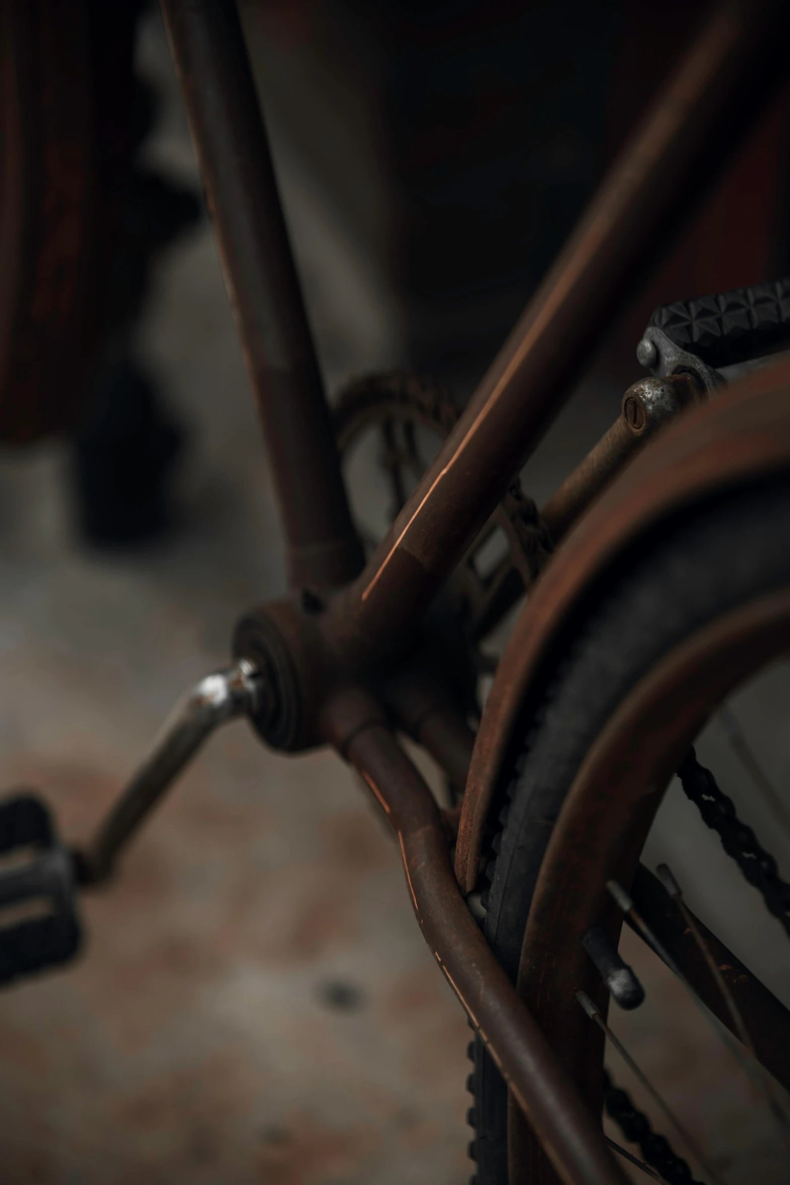 two bicycle tire levers are positioned against the side of the bicycle