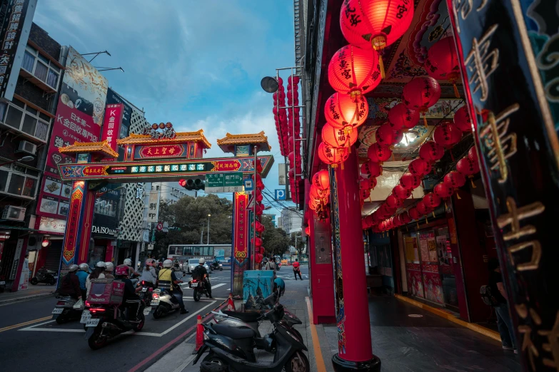 the oriental style street entrance is decorated for the upcoming chinese new year