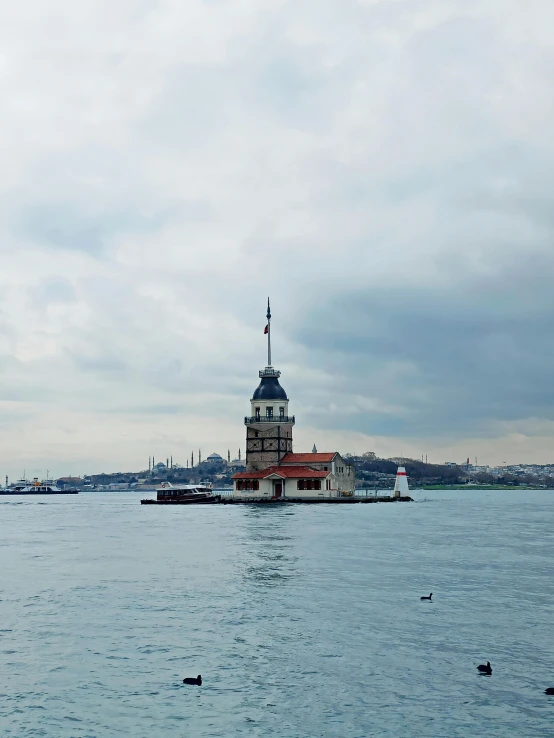 a large building in the middle of the water