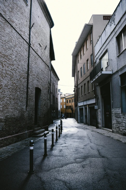 a street with several empty buildings on it